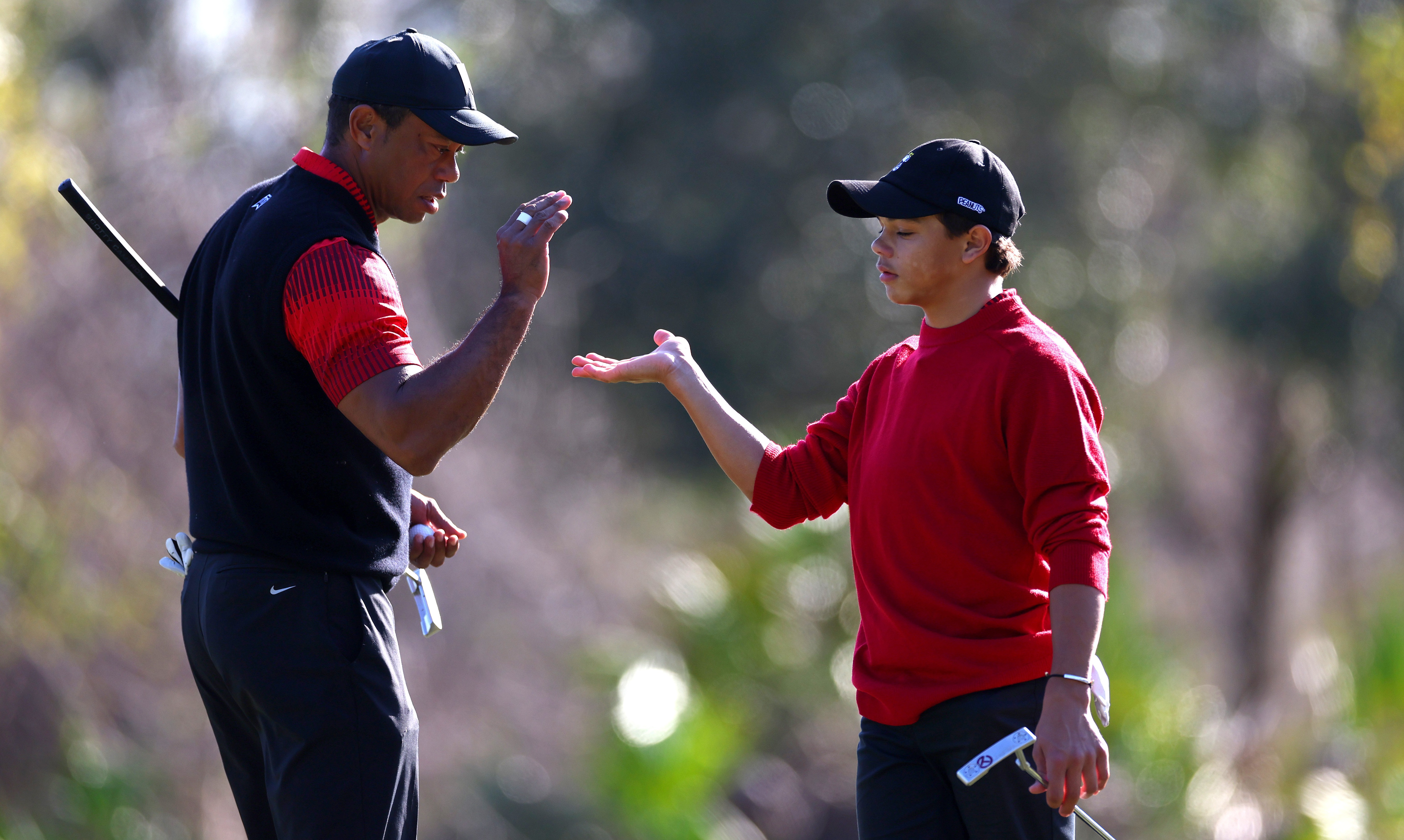 , Tiger Woods Spotted Caddying for Son Charlie and Fans Are Loving It!