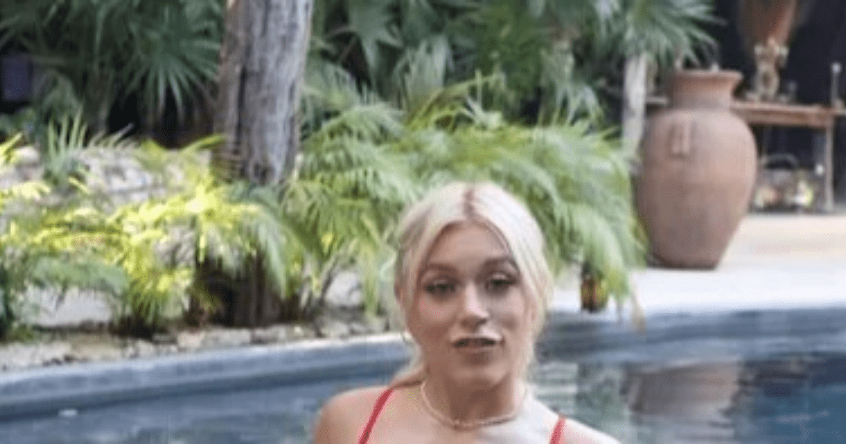 , Elle Brooke Stuns in Red Swimsuit While Relaxing in Pool